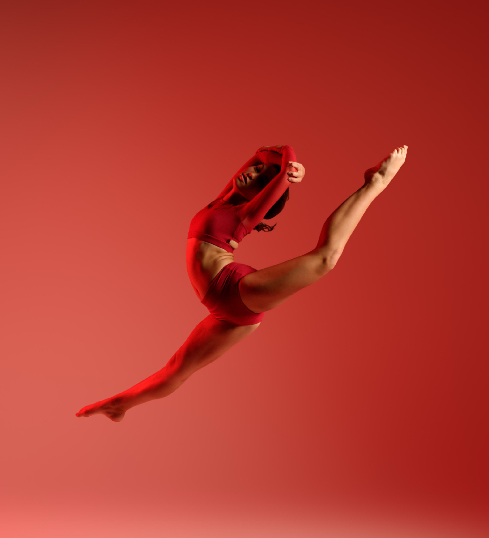 CK Dance student mid-air leap